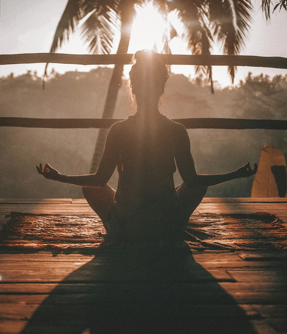 Person sitting peacefully during a meditation practice